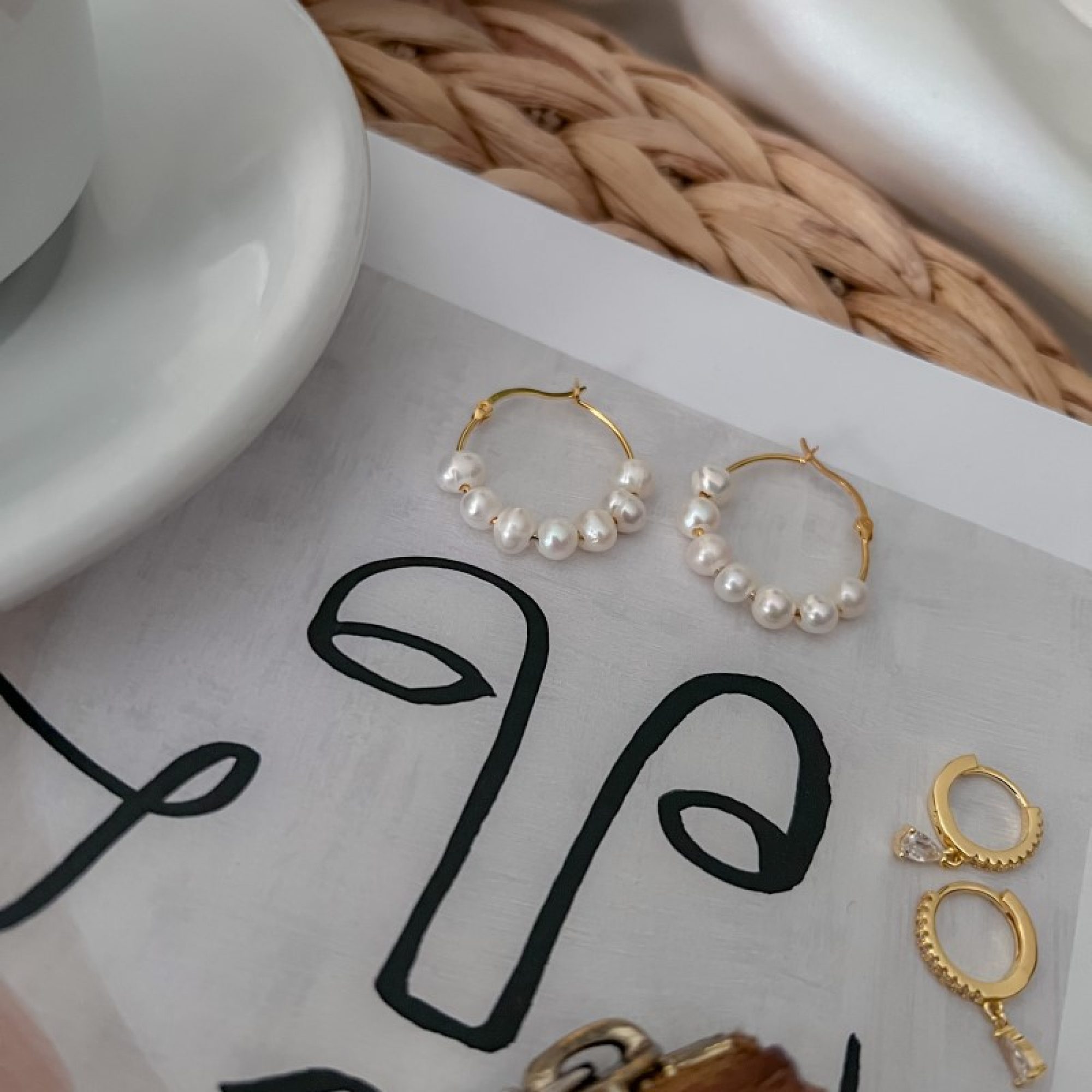 Gold plated earrings with real pearls
