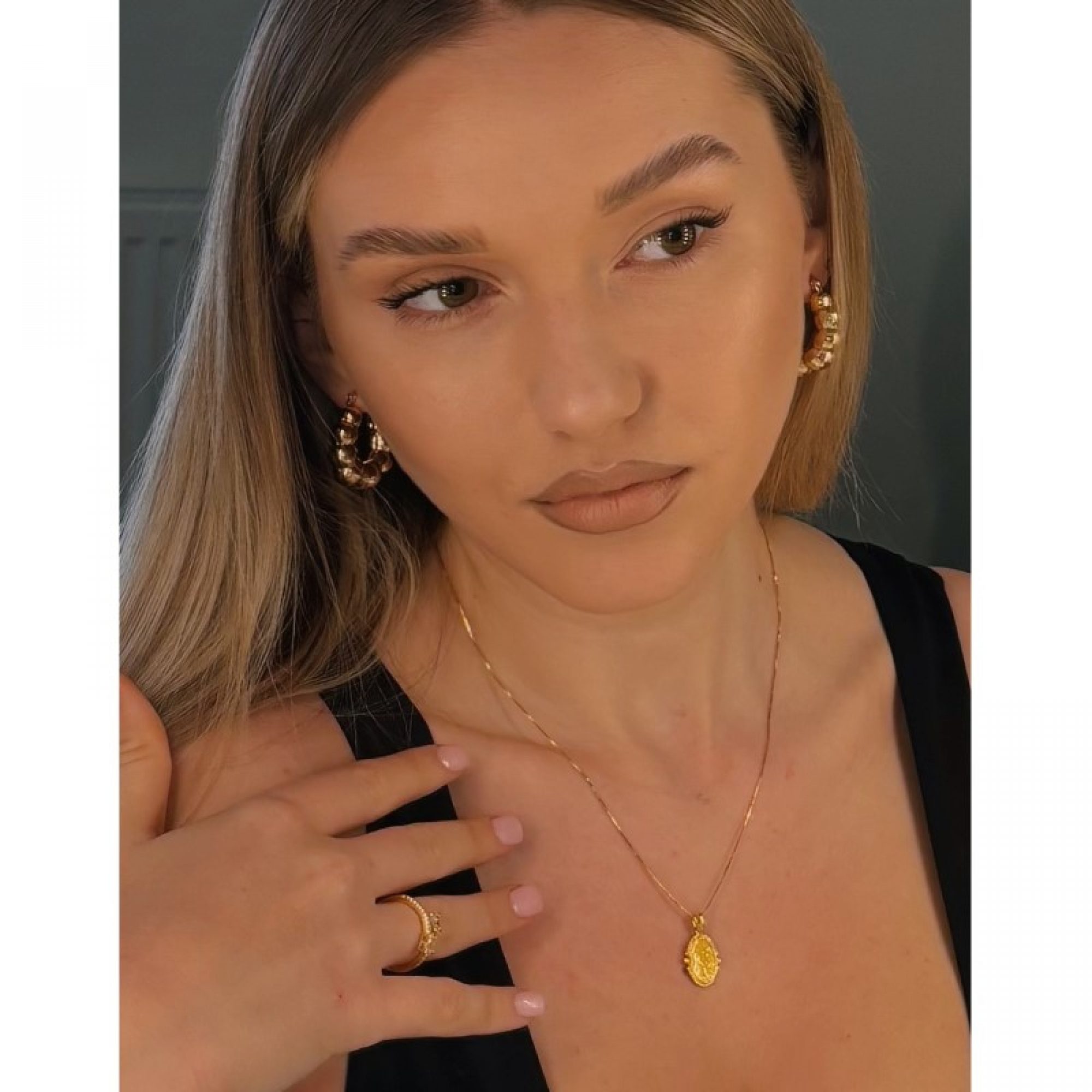 Gold plated ring with zircon stones