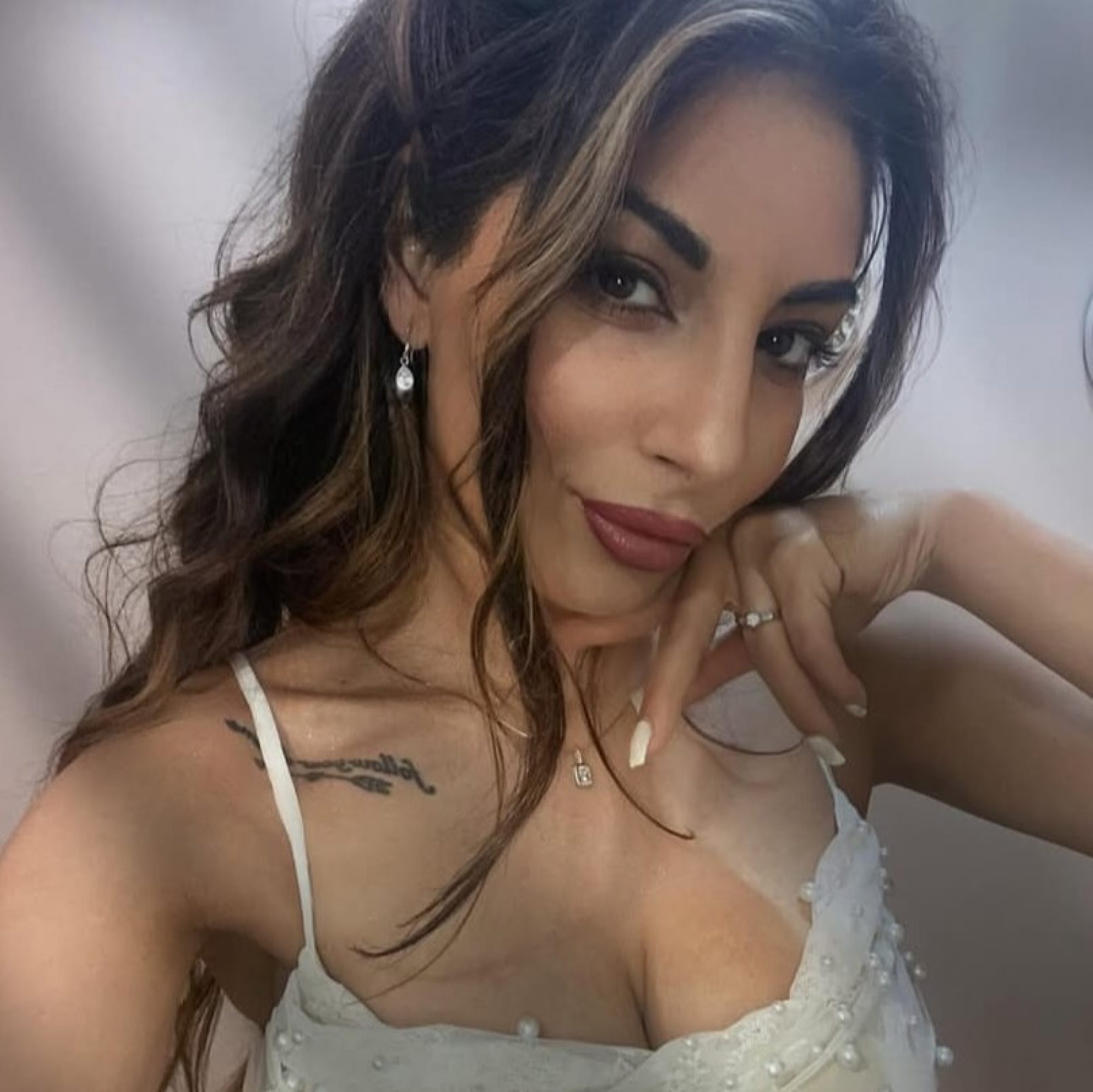 Silver dangle earrings with zircon stone