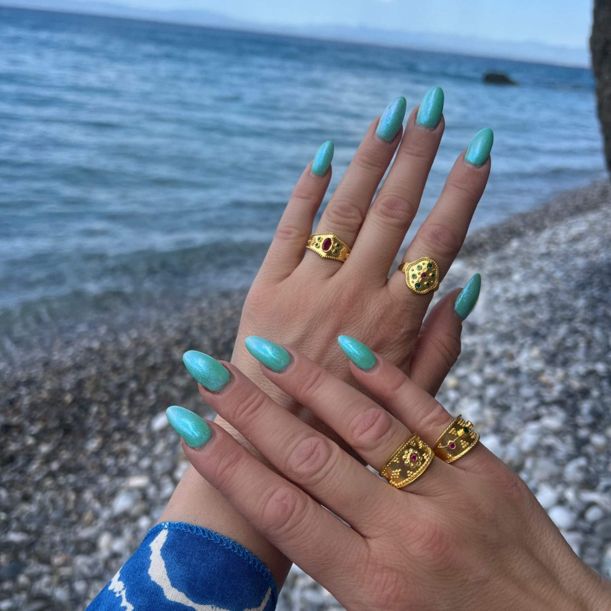 Gold plated ring with ruby and emerald stones