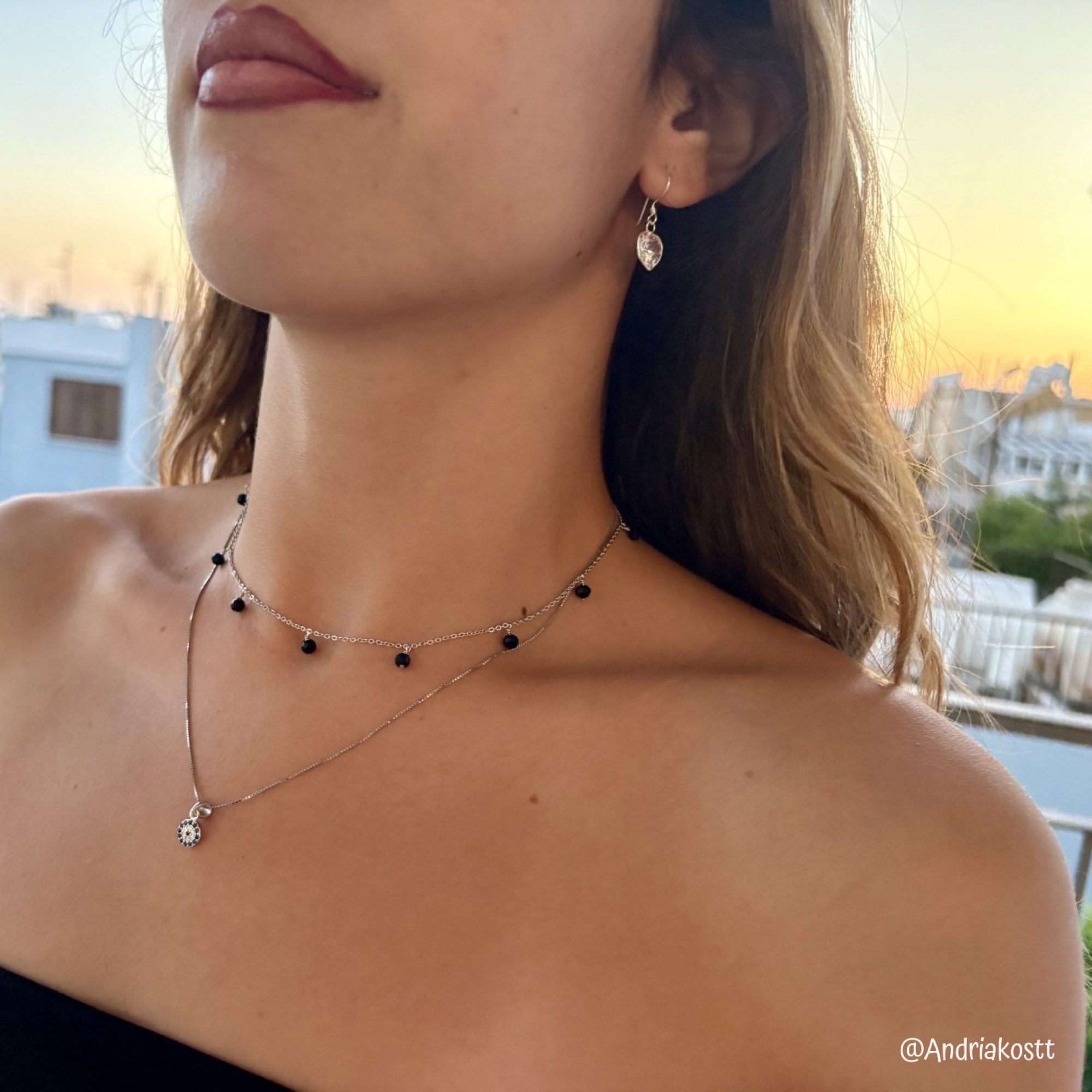 Silver dangle earrings with zircon stone