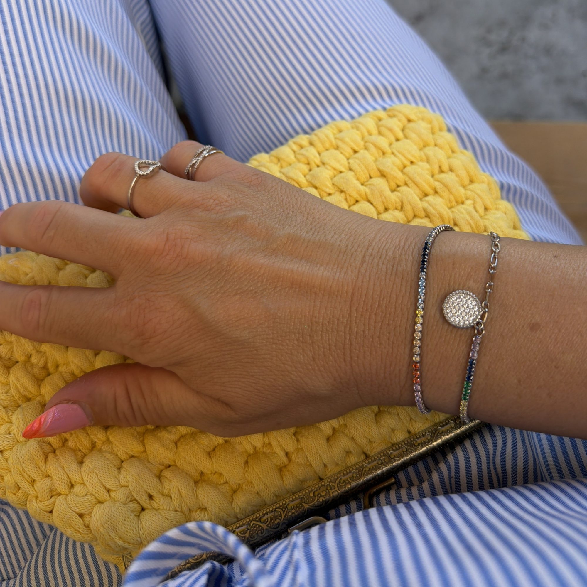 Tennis bracelet with multicoloured zircon stones