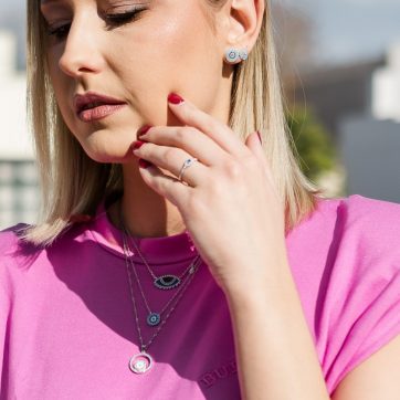 Eye stud earrings with zircon stones