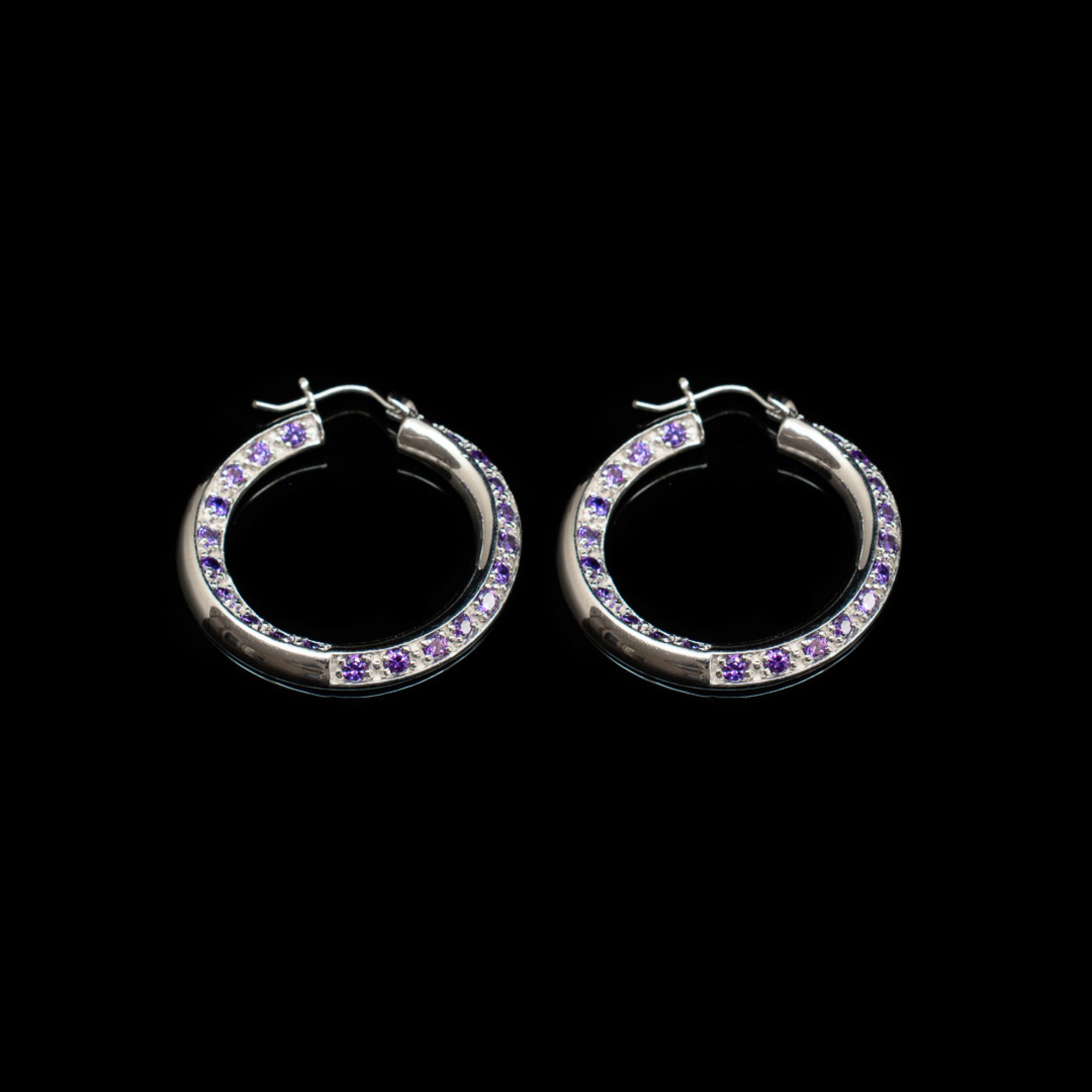 Silver hoops with amethyst stones