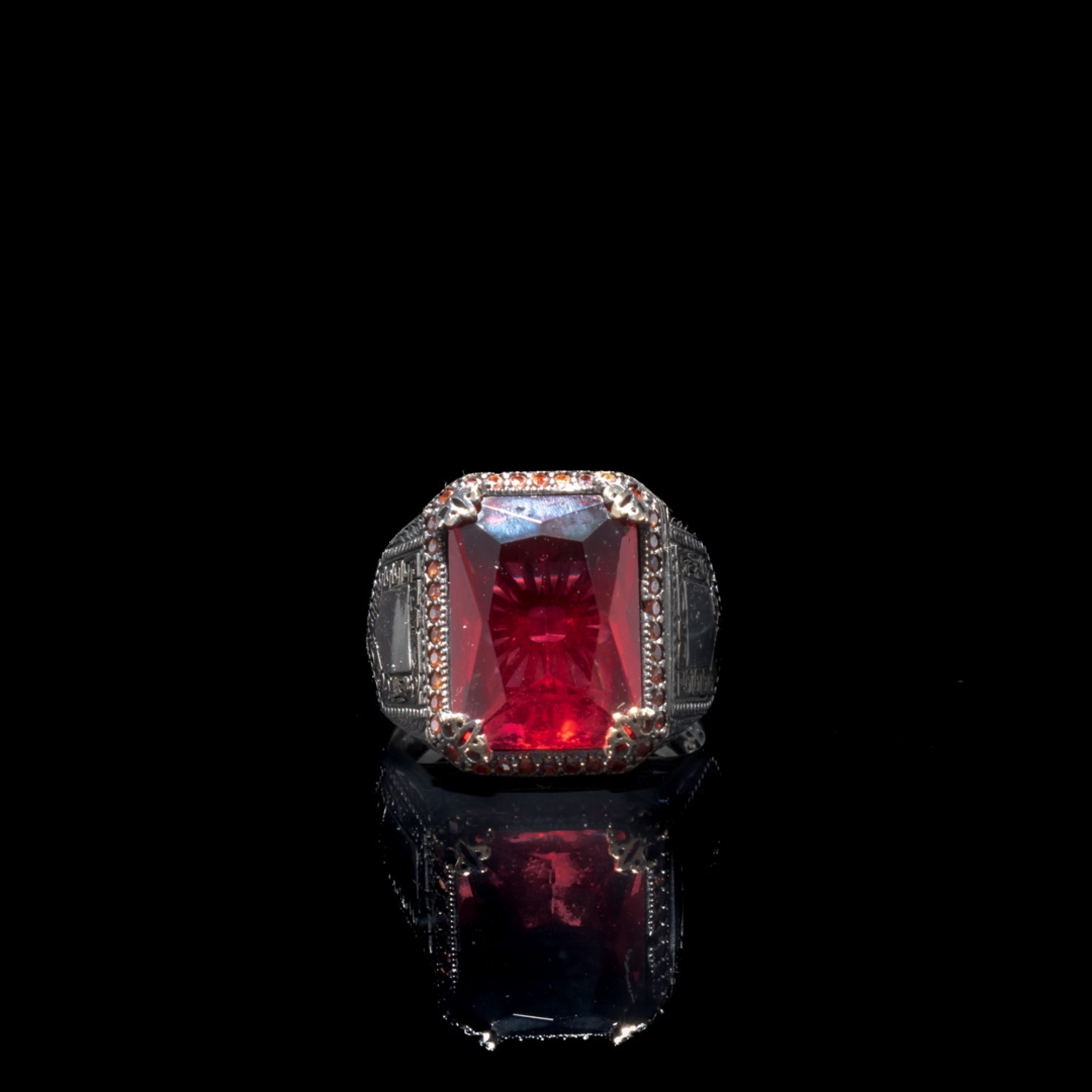 Silver ring with garnet stone